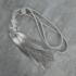 Kép 1/5 - Iza egy bojtos függönyelkötő glamour stílusban Ezüst
